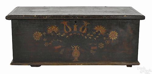 Pennsylvania painted poplar blanket chest, late 18th c., with a polychrome urn of flowers