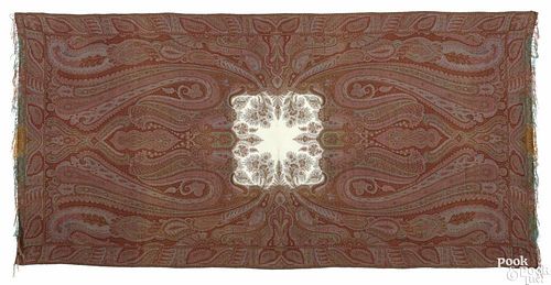 French paisley shawl, early 20th c., with a white center, 134'' x 65''.