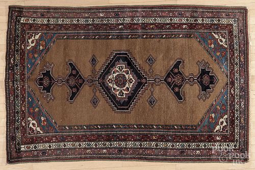 Northwest Persian carpet, early 20th c., with a camel hair field, 7' x 4'6''.