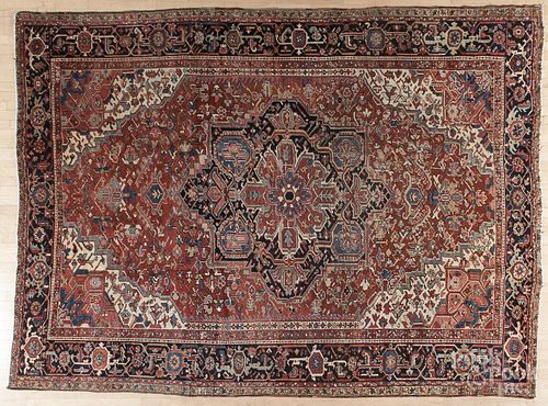 Heriz carpet, ca. 1920, 11'5'' x 8'10''.