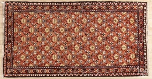 European woven carpet, early 20th c., 7'2'' x 3'9''.