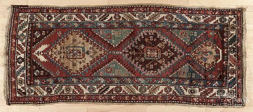 Northwest Persian carpet, early 20th c., 8'1'' x 3'4''.