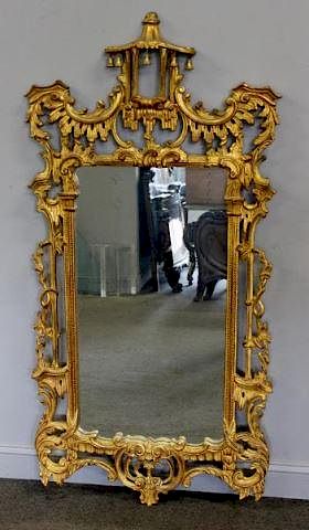 Carved and Giltwood Pagoda Style Mirror.