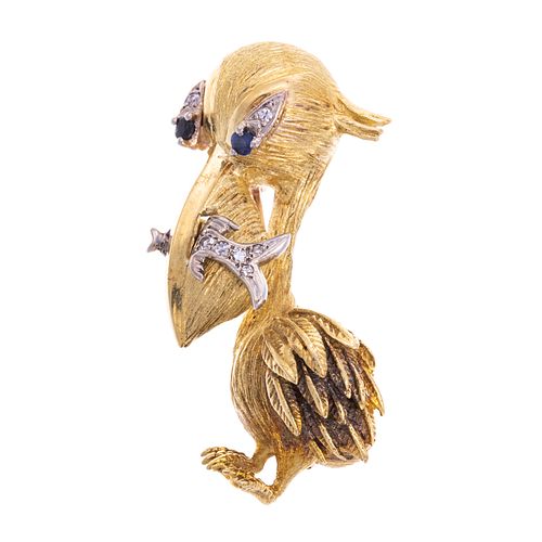 An 18K Vintage Whimsical Pelican with Fish Brooch