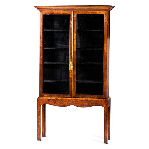 A Continental Curio Cabinet on Frame