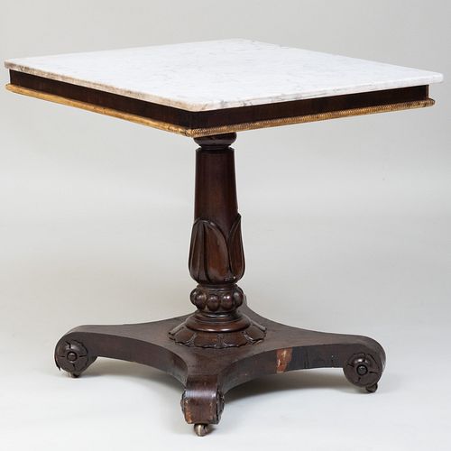 Victorian Carved Mahogany and Parcel-Gilt Center Table 