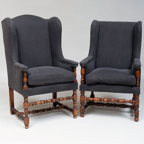 Two Similar Flemish Baroque Style Walnut Wing Chairs