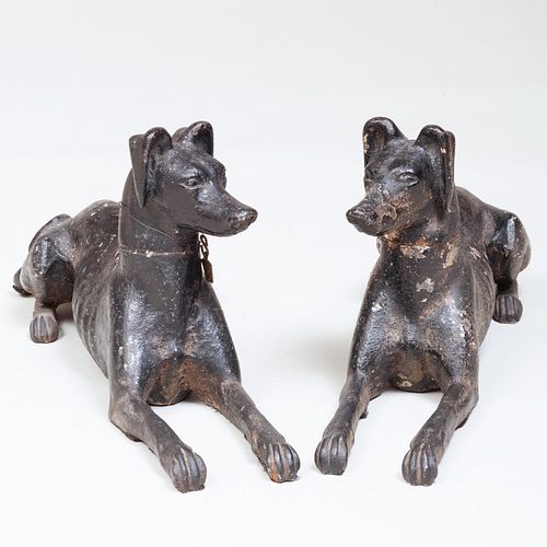Pair of English Black Painted Iron Models of Seated Whippets