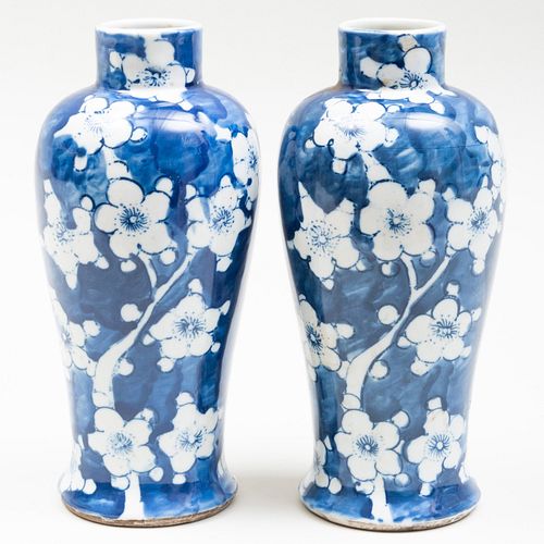 Pair of Chinese Blue and White Porcelain Vases Decorated with Prunus