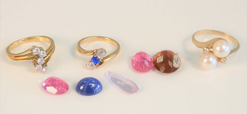 Three rings
to include one set with five diamonds, one set with two pearls and two diamonds, one with diamond and blue stone
plus five loose stones
to