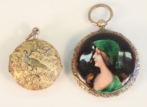 2 piece lot 14K gold and enameled locket with hinged door, along with silver Repousse locket with perforated interior door. 
Hallmarked with bird and 