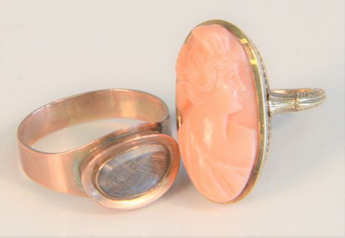 Three Victorian Rings to include;
one 14 karat cameo of coral, one mounted with hair and one woven with small gold plaque
sizes 4 1/2" and 8 1/4", tot