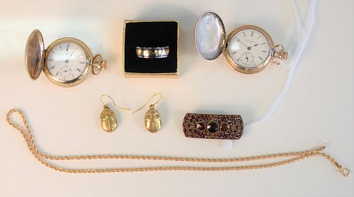 Seven Piece Lot 
to include two Elgin small closed face watches; one Titanium and 18 karat band; one pair of earrings; one Victorian brooch with red s