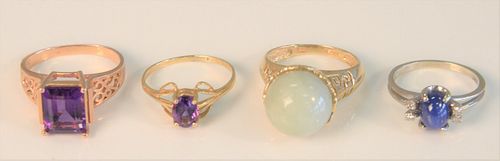 Four 14K Gold Rings
one with cabochon jadeite, two with amethyst along with one star sapphire
total weight 16.4 grams
