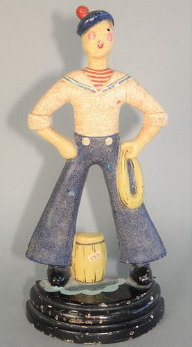 Cast Iron Sailor Doorstop
wearing bell-bottom pants and white shirt
height 12 inches
Provenance: The Estate of Diana Atwood Johnson