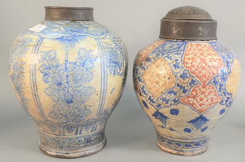 Two Early Jars in Persian Taste
each fitted with metal collar, decorated with Asian motif
height 12 1/2 inches and 13 1/2 inches
Provenance: The Estat