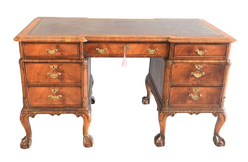 George III Style Walnut Knee-hole Desk
with leather tooled top, all set on ball and claw feet 
height 30 inches