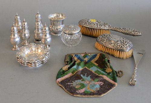 Sterling Silver Lot
to include set of six nut dishes, six pepper shakers; crystal jar, brushes, beaded purse, etc. 
14.9 t.oz. plus two brushes