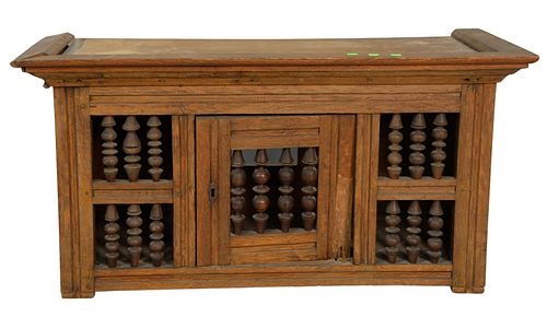 Oak Joined Cabinet
with spool door
early 18th Century
height 21", top 16 1/2" x 41"
(restored)
Provenance: The Estate of Diana Atwood Johnson