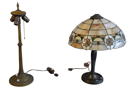 Two Piece Lot 
leaded glass table lamp and panel shade base
(leading at top pulling away)
height of base 25 inches
Provenance: Thirty-five year collec