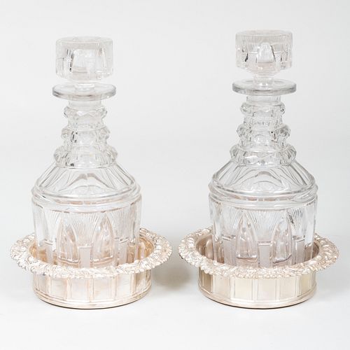 Pair of Silver Plate Bottle Coasters and a Pair of Cut Glass Decanters and Stoppers