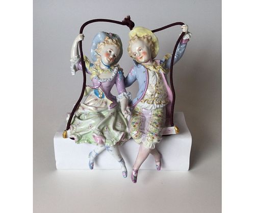 Porcelain Boy and Girl on Swing
