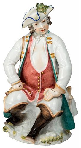 A PORCELAIN FIGURE OF A SEATED HUNTER, MEISSEN, AFTER A MODEL BY PAUL SCHEURICH