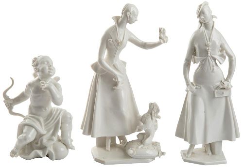 A GROUP OF THREE PORCELAIN FIGURES, TWO OF YOUNG LADIES AND ONE PUTTO, NYMPHENBURG, AFTER A MODEL BY PAUL SCHEURICH