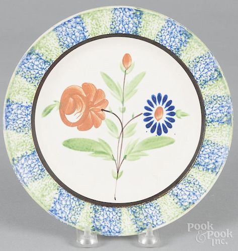 Blue and green spatterware plate, 19th c., with unusual floral decoration, 8 1/2'' dia.