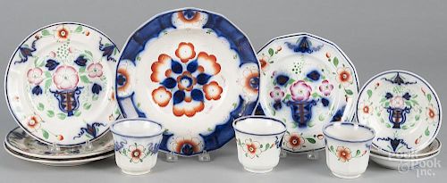 Eleven pieces of Gaudy ironstone porcelain, 19th c., to include plates, bowl, cups and saucers