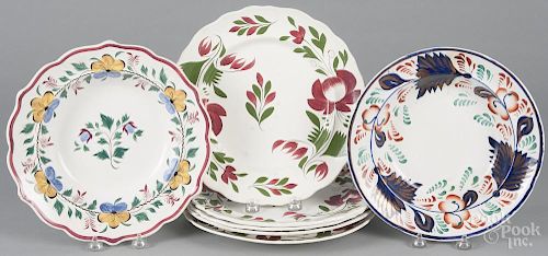 Five Adam's Rose porcelain plates, 19th c., 10 3/4'' dia., together with a floral shallow bowl