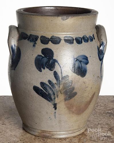 Pennsylvania stoneware crock, 19th c., with vibrant cobalt floral decoration on each side, 9 3/4'' h.