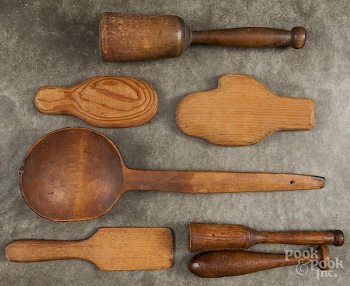 Woodenware, 19th c., to include mitten stretchers, mashers, a ladle, etc.
