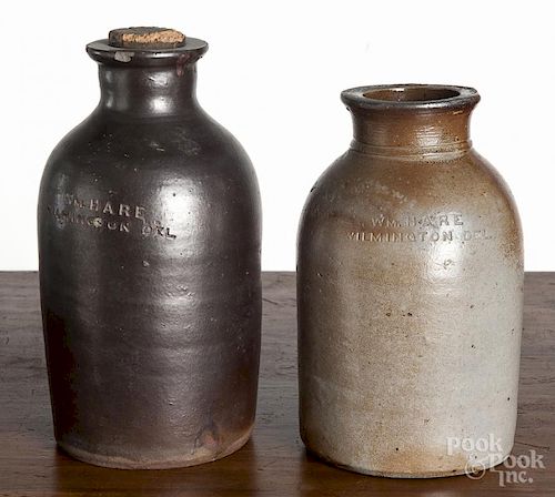 Two Delaware stoneware jars, 19th c., impressed Wm. Hare Wilmington Del., 7 1/2'' h. and 8 1/2'' h.