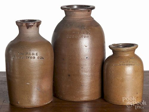 Delaware stoneware bottles, 19th c., impressed Wm. Hare Wilmington Del., 9 1/4'' h., 8'' h.