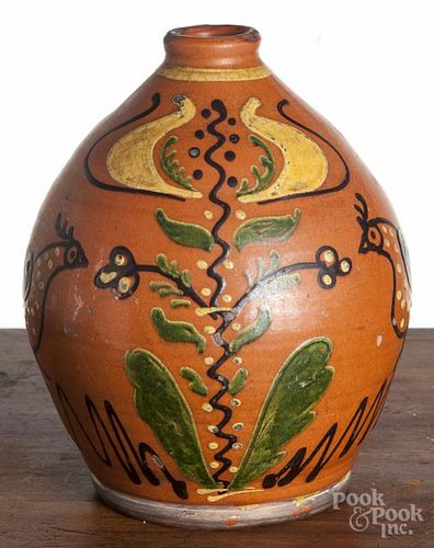 Greg Shooner redware jug, signed and dated 1999, with tulip and bird decoration, 9'' h.