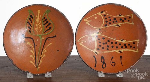 Two Greg Shooner redware plates, signed and dated 1999 and 2001, 8 3/4'' dia.