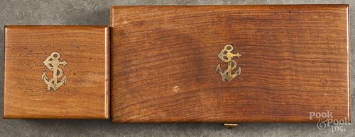 Brunton contemporary hand held compass in an inlaid mahogany box, 3'' dia.