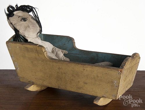 Pennsylvania painted pine doll cradle, 19th c., retaining its original yellow and blue surface