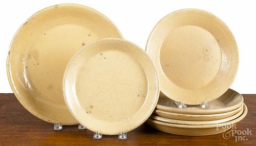 Seven yelloware plates, 19th c., largest - 11 1/4'' dia.