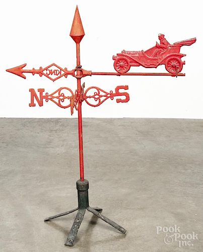 Zinc car and driver weathervane, early 20th c., with a cast iron banner, inscribed King