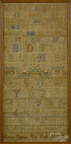 Silk on linen sampler, dated 1818, wrought by Ester Taylor, 17 1/2'' x 8''.