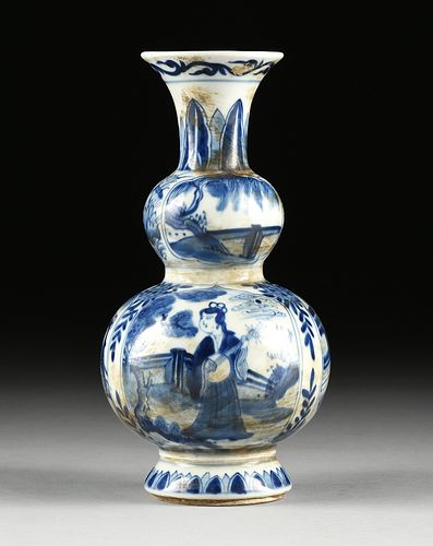 A CHINESE DOUBLE GOURD BLUE AND WHITE PORCELAIN VASE, SHIPWRECK ARTIFACT, LEAF MARK, KANGXI PERIOD, EARLY 18TH CENTURY,