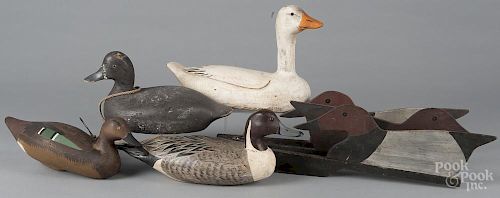 Three carved and painted duck decoys, 20th c., a blue wing teal with later signed inscription