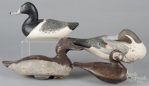 Four carved and painted duck decoys, 20th c., largest - 14 1/2'' l.