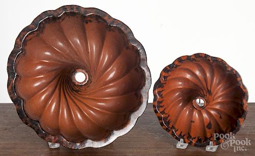 Two redware molds, 19th c., 2 1/2'' h., 7 1/4'', 4'' w., 10 3/4'' d.
