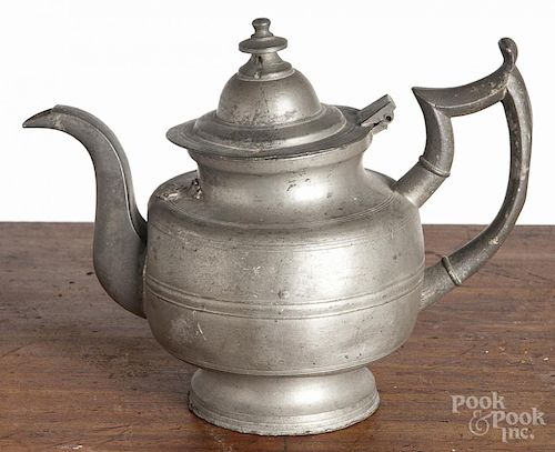 Two American pewter teapots, 19th c., stamped Putnam and E. Smith, 7 3/4'' h. and 7 1/4'' h.