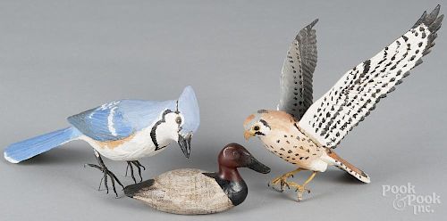 Miniature carved and painted peregrine falcon and blue jay, 20th c., 6 1/2'' l. and 9 1/2'' l.