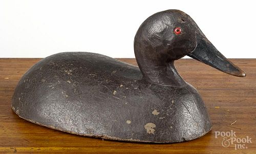 Two carved and painted duck decoys, mid 20th c., the canvasback attributed to Michigan, 15'' l.