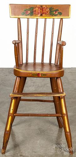 Pennsylvania painted plank seat high chair, 19th c., with a floral crest.